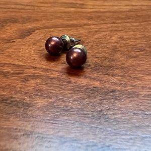Dark purple bead earrings.
